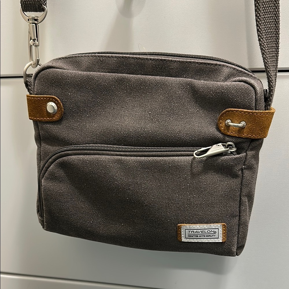 TRAVELON anti-theft crossbody bag with locking zippers and RFID. Used once. EUC